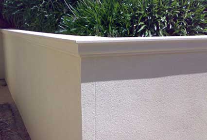 Rendered wall with architectural molding